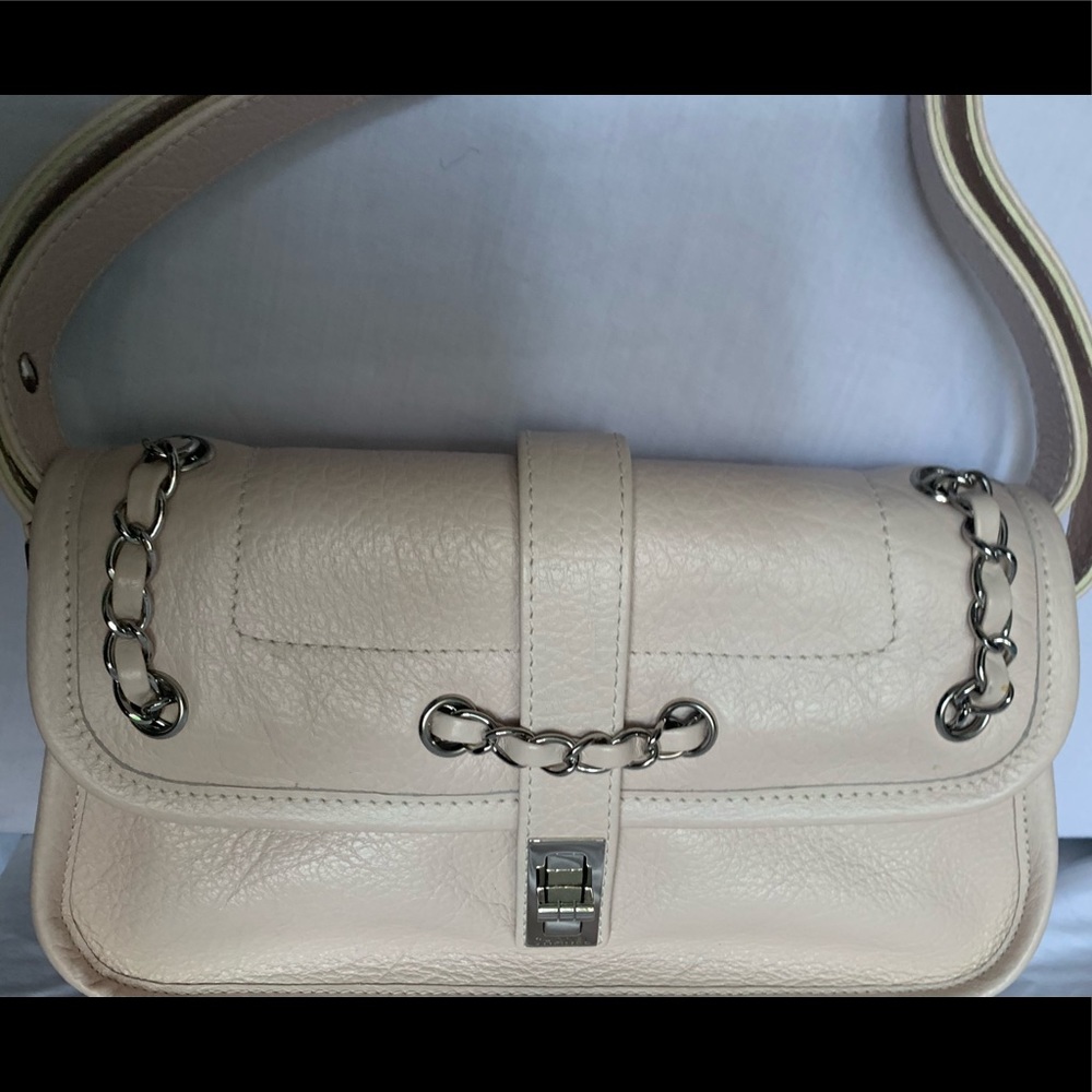 🥳Authentic Chanel flap bag is blush colored with chain. Authentic-